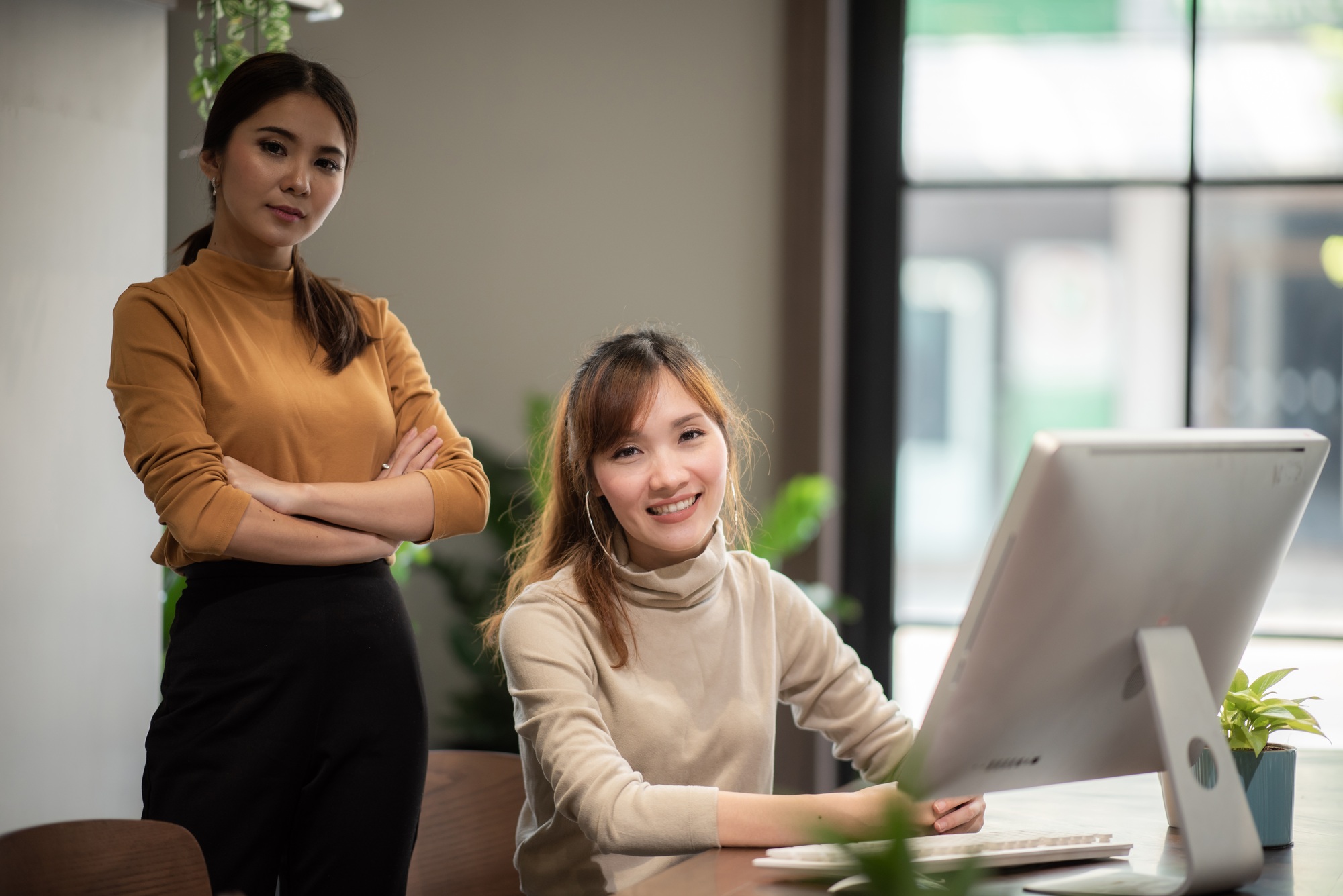 Female business financial advisor consulting a client